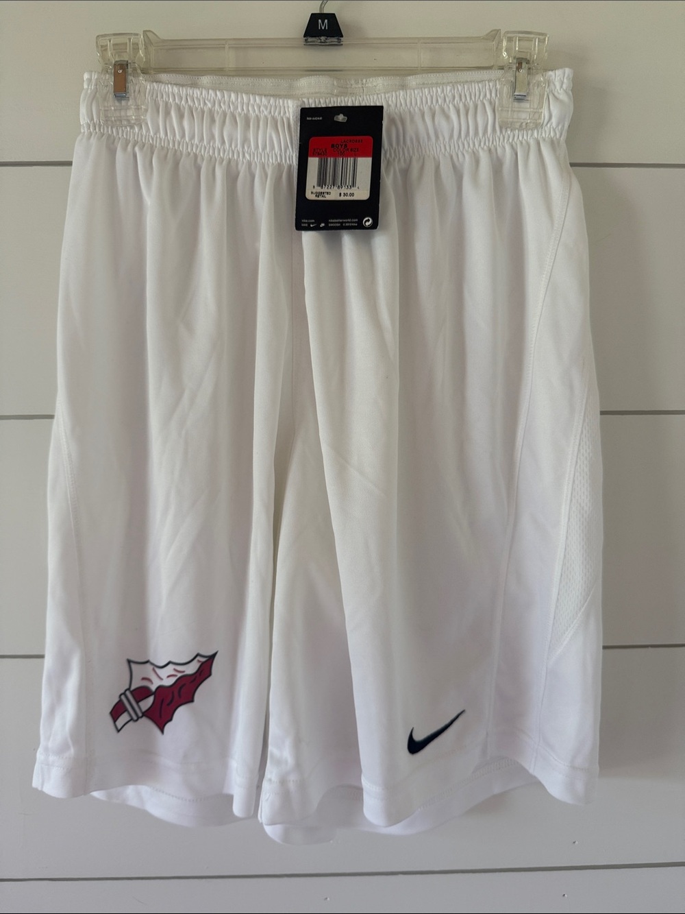 Nike Boys White Athletic Shorts with Navy Swoosh and Red Logo